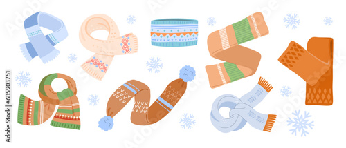 Set of warm winter knitted neck scarves for children and adults of different shapes, colors and patterns. Cute vector illustration with snowflakes on white isolated background in cartoon style.