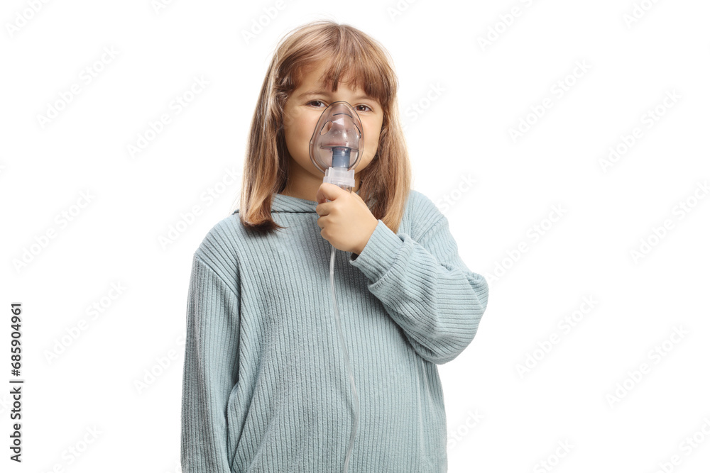 Little girl using a portable inhaler mask Little girl using a portable inhaler mask