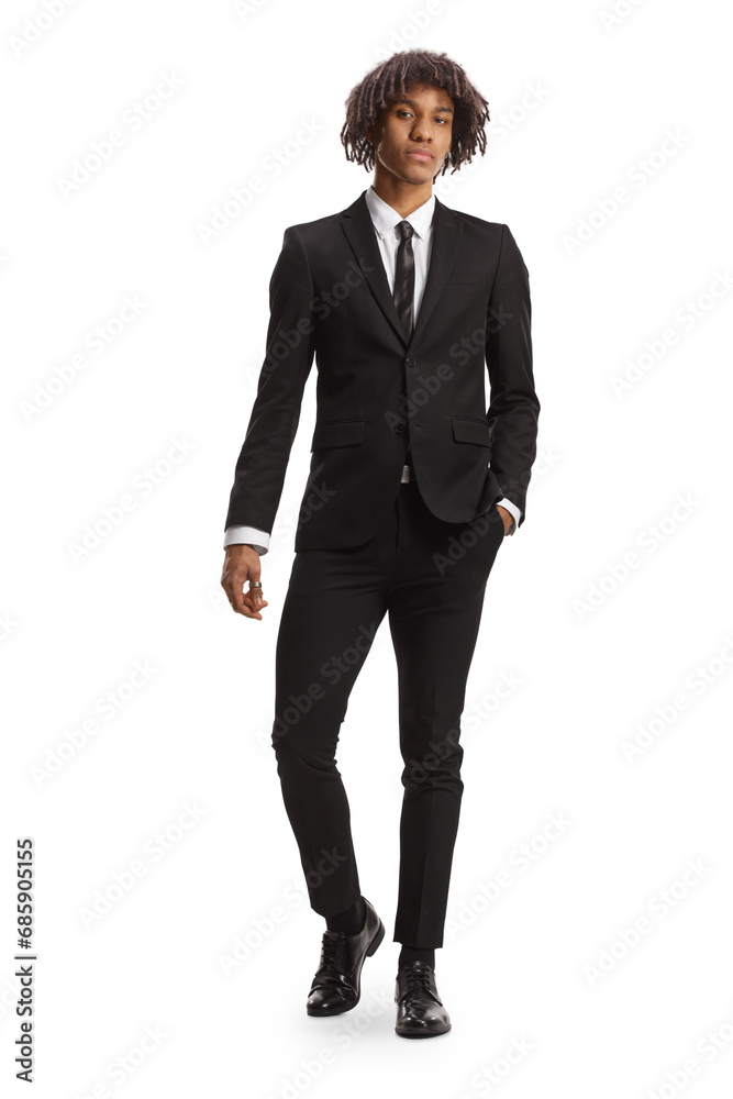 Full length portrait of a young handsome african american guy in a black suit Full length portrait of a young handsome african american guy in a black suit