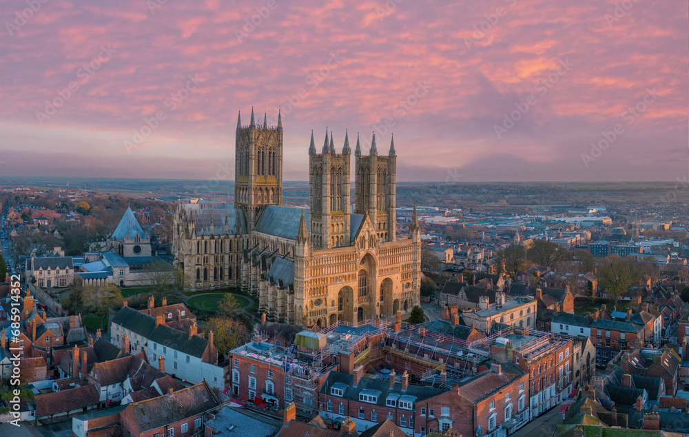 Lincoln, UK. Cathedral and City at sunset. Aerial view of the British city of Lincoln United Kingdom. Steep Hill and historic church - obrazy, fototapety, plakaty 