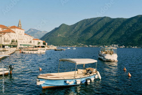 Excursion boats are moored off the coast of Perast. Montenegro