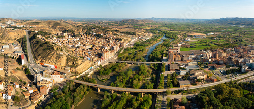 Bird's eye view of Spanish town Fraga. Cinca River visible from above. photo