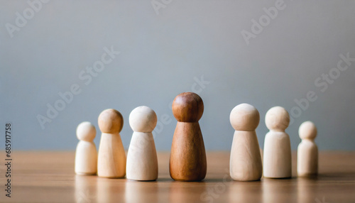 Group of diverse wooden figurines in a line  symbolizing unity  teamwork  and community in social gatherings  isolated on a wooden table background with Christmas decorations