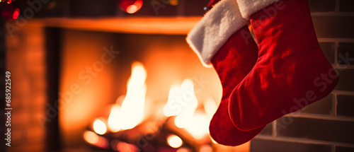 Many Christmas stockings hanging on a fireplace waiting for the arrival of Christmas