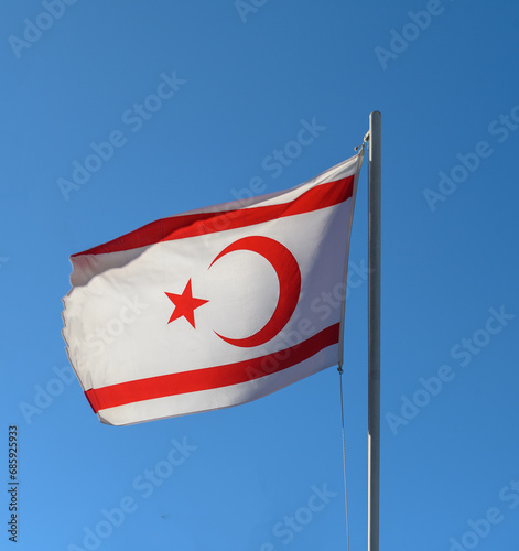 flag of the Turkish Republic of Northern Cyprus against a blue sky 1