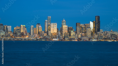 Evening blue sky and water with Seattle downtown illumined with building lights © IanDewarPhotography