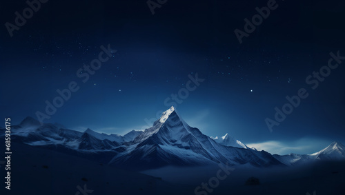 The soft glow of the moonlight on the snowy mountaintops creates a magical and serene atmosphere