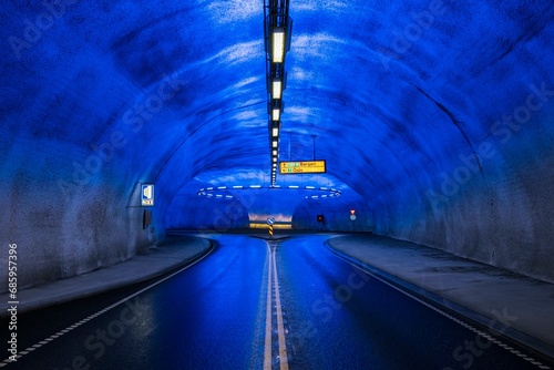 Blue illuminated roundabout in tunnel, Eidfjord, Hardangerfjord, Norway, Europe photo