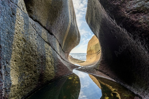 Nesvaghalo rock formation, cave on the coast, Sokndal, Rogaland, Norway, Europe photo