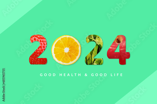 2024 Happy New Year for healthcare on green background. Fruit and vegetables which make 2024 number. strawberry, orange, apple.