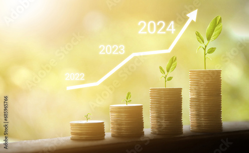 Growing growth year 2021 to 2024. Business graph with arrow up. Growing money coins stack. Saving money investment.