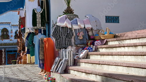 Clothing and textiles for sale in the medina, in Chefchaouen, Morocco © Angela