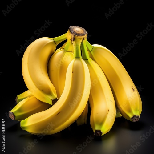 A fresh banana on a crisp black background