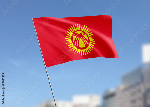 Kyrgyzstan flag waving in the wind.