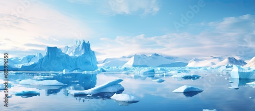 Greenland's Ilulissat icefjord features vast icebergs from melting glaciers, showcasing the beauty of the Arctic. photo