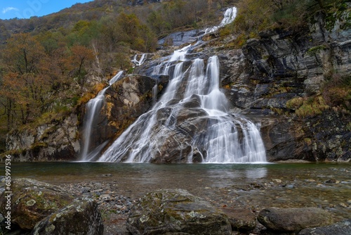autumn landscape view of the Cascata delle Sponde waterfall near Someo in the Ticino in Switzerland