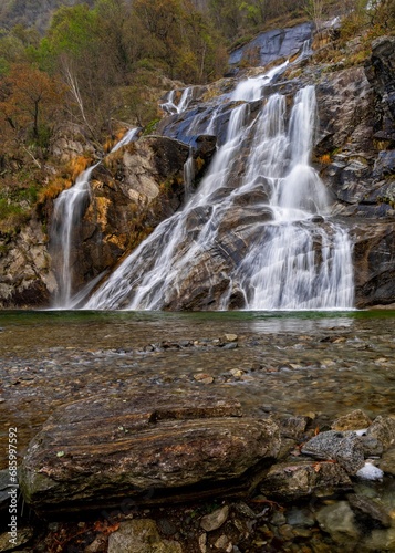 vertical view of the Cascata delle Sponde waterfall near Someo in the Ticino in Switzerland photo