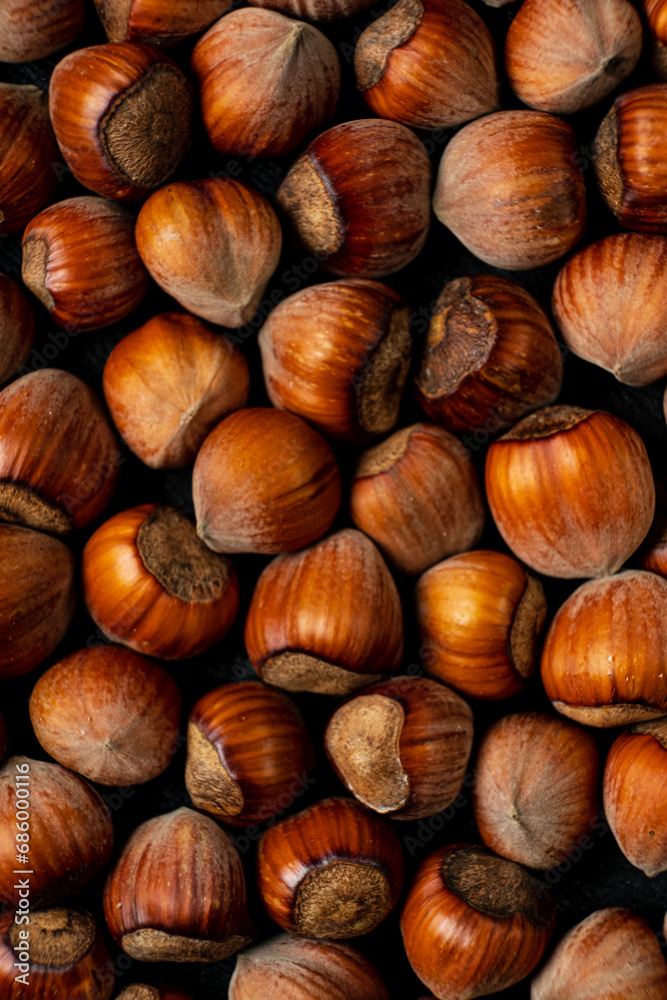 Hazelnuts background. Close up of a group of hazelnuts Hazelnuts background. Close up of a group of hazelnuts
