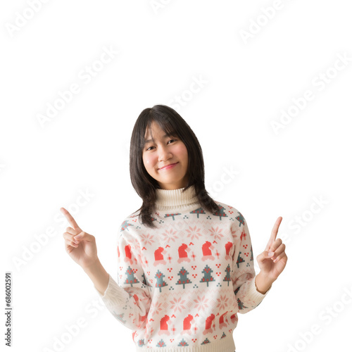 Portrait happy smiling asian teenager girl hands pointing space, Wearing a Christmas sweater winter season clothes, isolated on white and transparent background