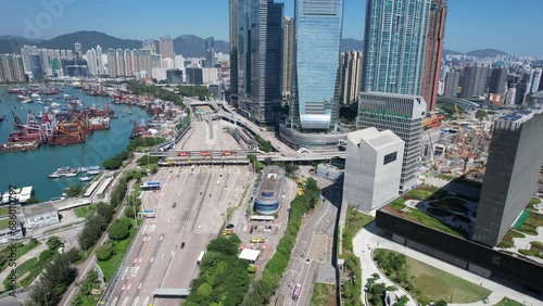 West Kowloon Cultural Area, A Waterfront Leisure Promenade Palace Museum Freespace near Tsim Sha Tsui, Central, Victoria Harbour, Hong Kong in the background, Aerial drone skyview photo