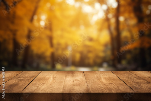 wooden table top empty, blur autumn yellow background