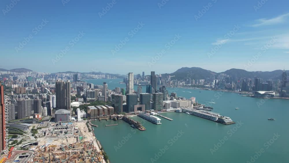 West Kowloon Cultural Area, A Waterfront Leisure Promenade Palace Museum Freespace near Tsim Sha Tsui, Central, Victoria Harbour, Hong Kong in the background, Aerial drone skyview West Kowloon Cultural Area, A Waterfront Leisure Promenade Palace Museum Freespace near Tsim Sha Tsui, Central, Victoria Harbour, Hong Kong in the background, Aerial drone skyview