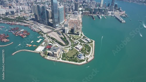 West Kowloon Cultural Area, A Waterfront Leisure Promenade Palace Museum Freespace near Tsim Sha Tsui, Central, Victoria Harbour, Hong Kong in the background, Aerial drone skyview photo