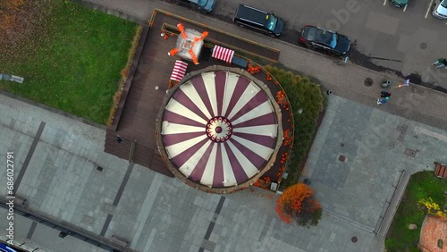 Drone shot of spinning carousel based in the old town of Gdansk photo