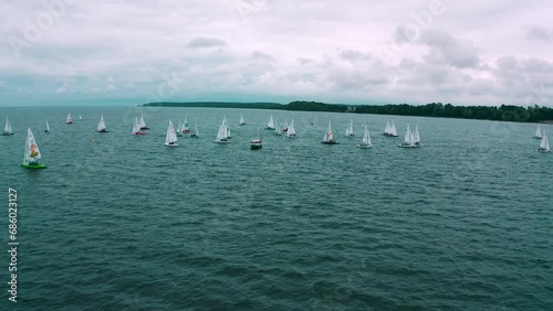 Panoramic view of ships racing in regatta on the deep sea waters photo