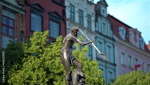 Sunny day shot of Neptune statue in Gdansk Poland photo