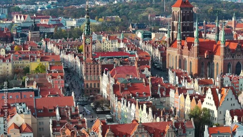 Drone shot of old town in Gdansk, Poland with St. Mary's Church and Town Hall in the background photo