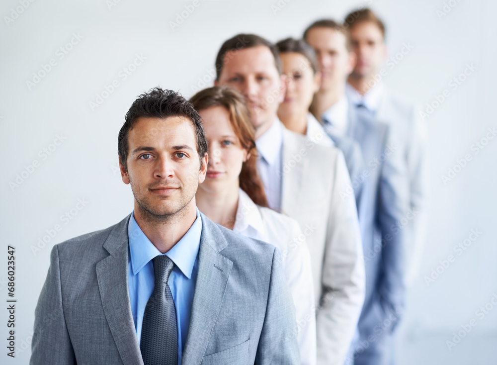 Man, portrait and happy for future finance career, standing and ready for job interview. Worker, corporate accountant in suit and professional in workplace, people in background and confident Man, portrait and happy for future finance career, standing and ready for job interview. Worker, corporate accountant in suit and professional in workplace, people in background and confident