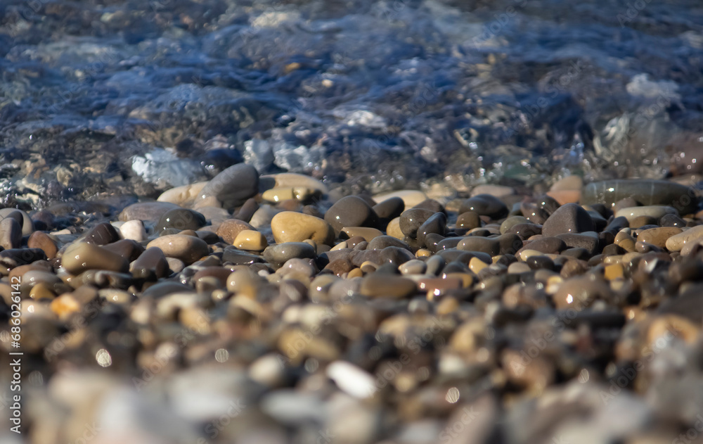 Landscape on the seashore ,pebbles with calm waves Landscape on the seashore ,pebbles with calm waves