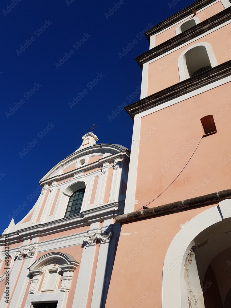 Fototapeta premium Ancient Christian Catholic church against the blue sky
