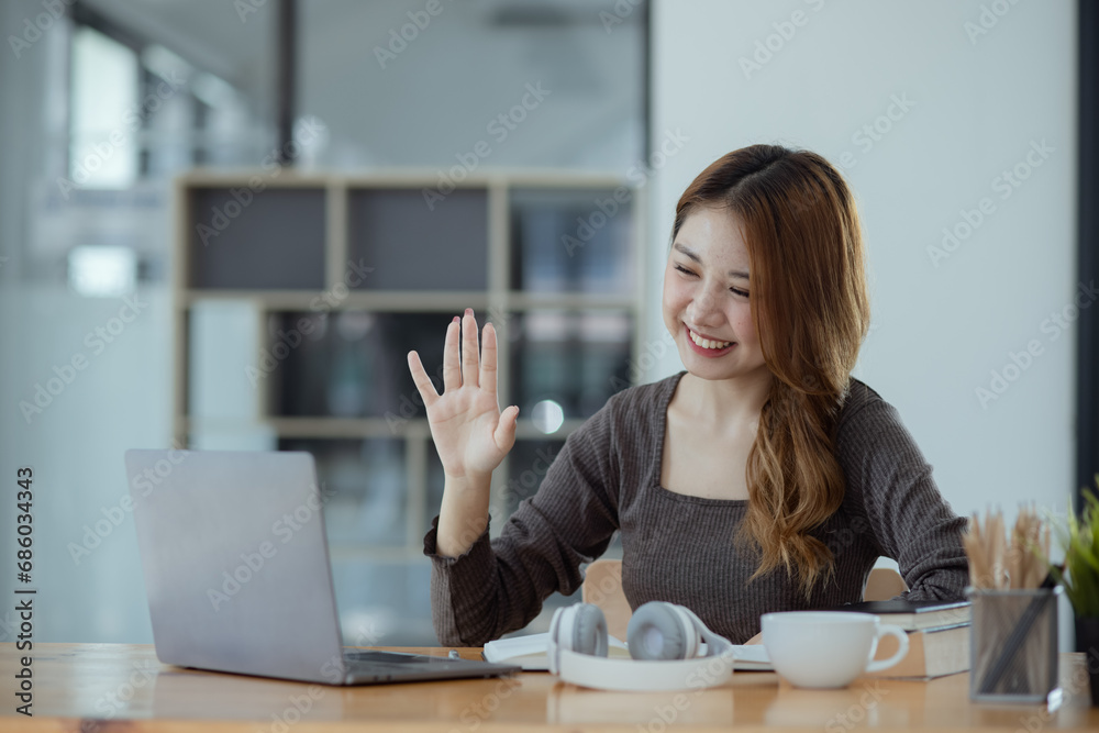 young asian woman and online education at desk. young asian woman and online education at desk.