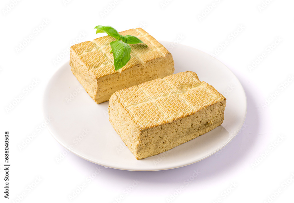 Tofu Cheese Isolated, Smoked Vegan Cheese Slice, Sliced Soya Bean Curd, Soy Protein or TSP Tofu Cheese Isolated, Smoked Vegan Cheese Slice, Sliced Soya Bean Curd, Soy Protein or TSP