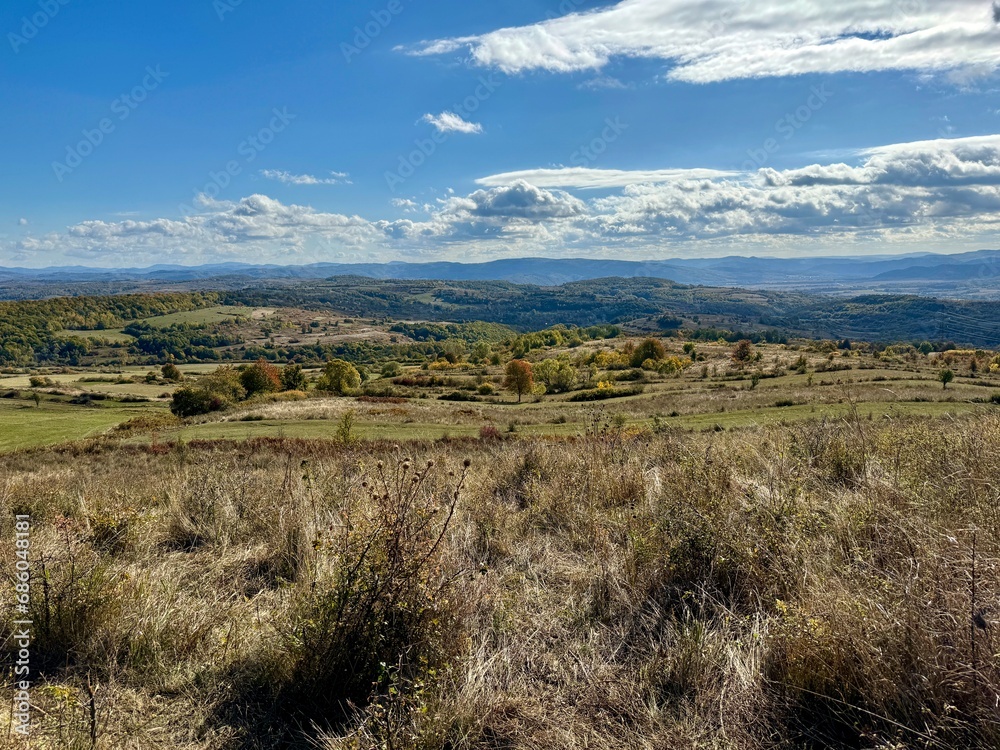 landscape with mountains and clouds