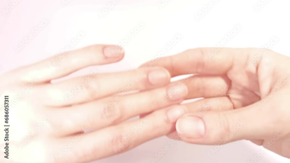 Showing the correct shape of healthy natural nails. Female fingers with a nude manicure. Close-up view Showing the correct shape of healthy natural nails. Female fingers with a nude manicure. Close-up view