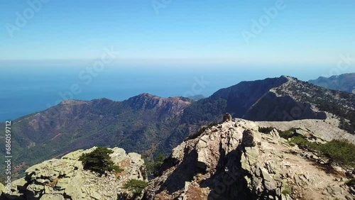 Aerial landscape seen from the drone of the Ipsarion or Ypsarion mountain in Thassos , Greece , the highest mountain of the island with Mediterranean specific vegetation , pines and shrubs photo