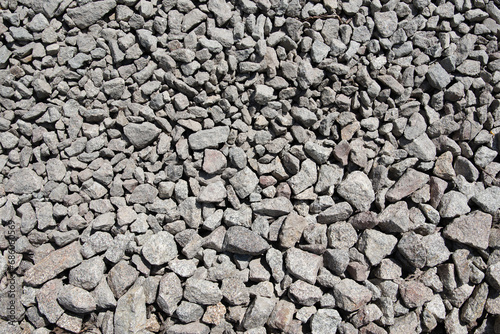 texture of gray gravel stones on ground for the construction industry