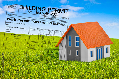 Building Permit concept with imaginary building approvation and residential home model in a rural scene photo