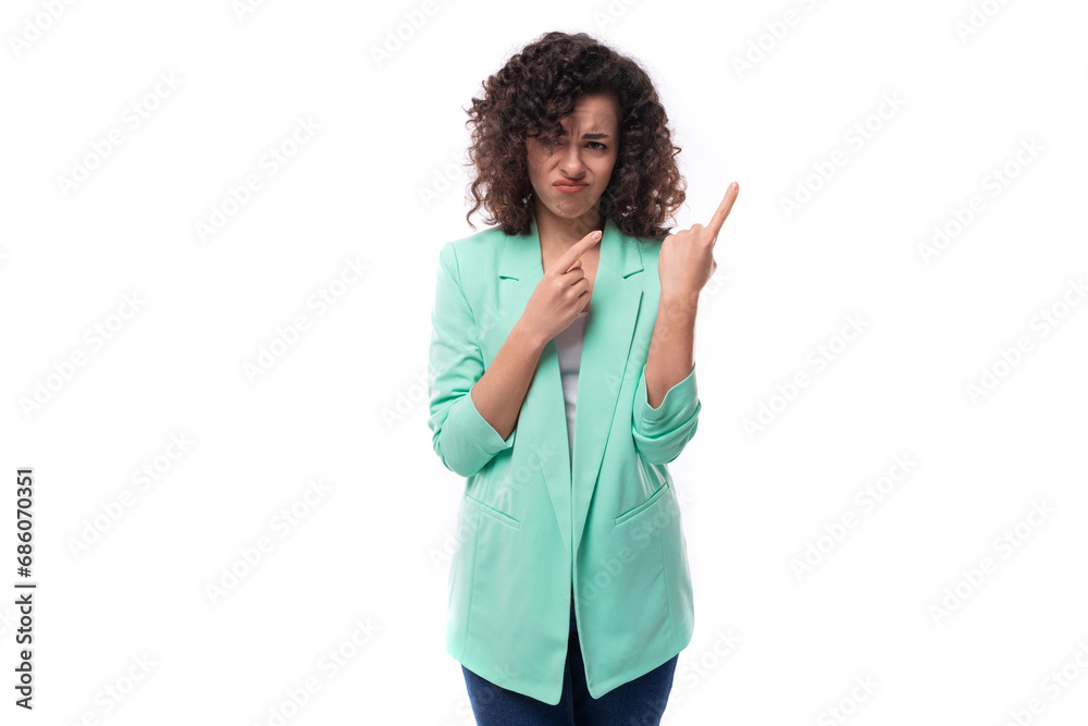 Fototapeta premium young leader woman with curly black hair showing fingers advertising space