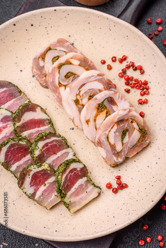 Delicious meatloaf with lard, salt, spices and herbs cut into slices