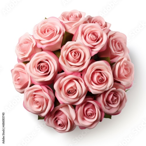 A bouquet of pink roses on a white surface