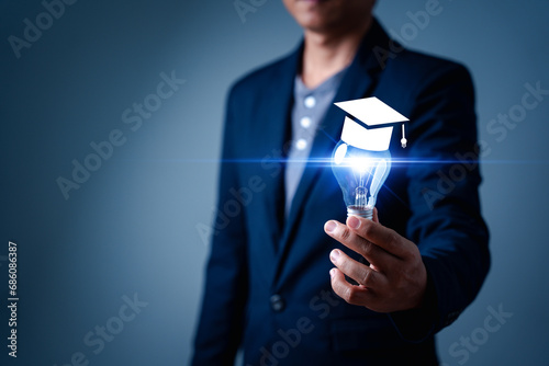 Man hands showing light bulb, E-learning graduate certificate program concept. Internet education course degree, study knowledge, creative thinking ideas, problem-solving solutions