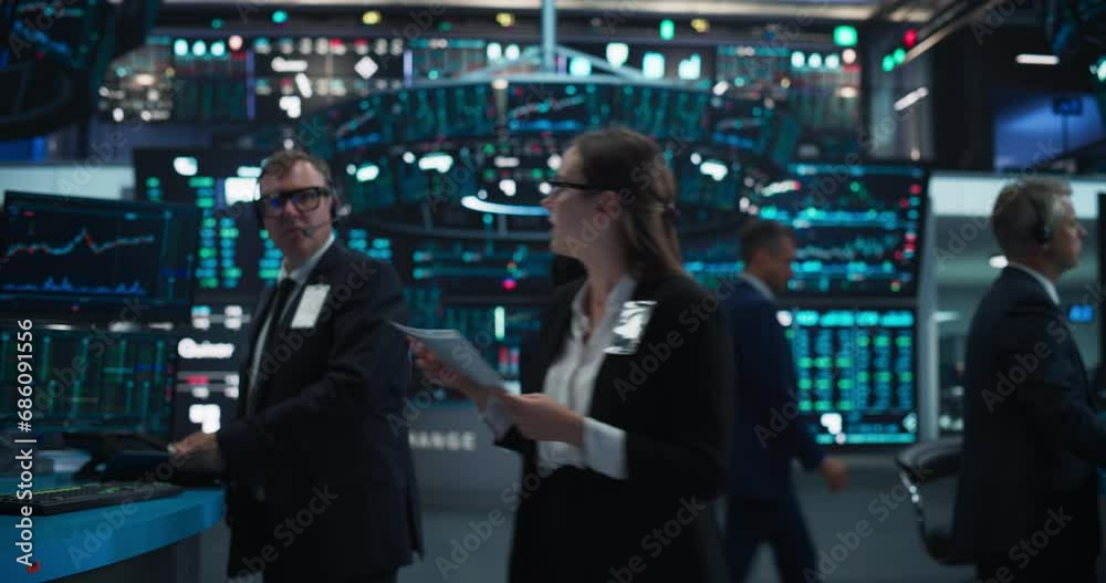 Traders Working in Office with Multiple Computer Screens with Real-Time Stocks, Commodities and Exchange Market Charts. Zoom Out Footage From a Close Up Tablet Computer Screen with Stock Market Chart Traders Working in Office with Multiple Computer Screens with Real-Time Stocks, Commodities and Exchange Market Charts. Zoom Out Footage From a Close Up Tablet Computer Screen with Stock Market Chart