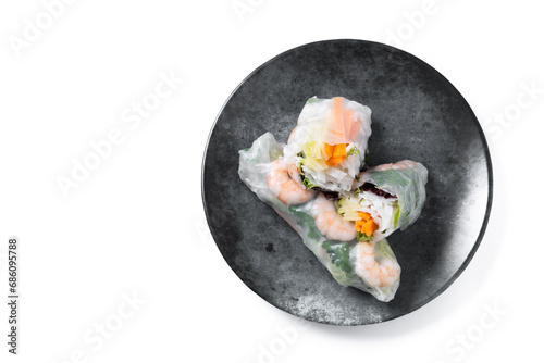 Vietnamese spring rolls with vegetables, rice noodles and prawns isolated on white background. Top view. Copy space