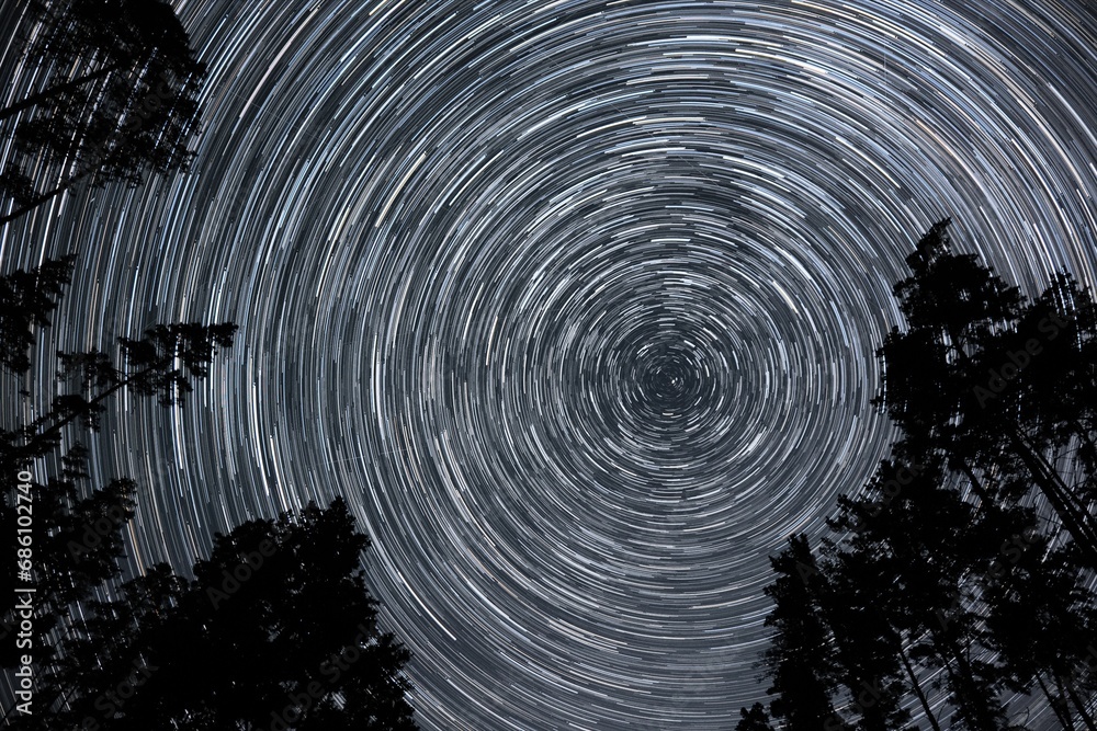Star trails in the night sky Stock Photo | Adobe Stock