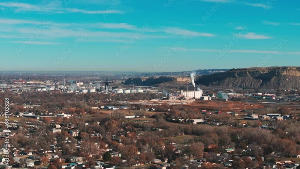 Drone aerial view of petroleum plants in Billings Montana with mountains Drone aerial view of petroleum plants in Billings Montana with mountains