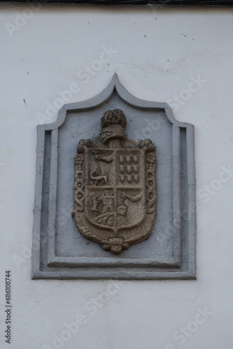 Cebreros, Ávila, Spain, November 28, 2023: Eraldic shield on the facade of a house in the town of Cebreros, Ávila, Spain